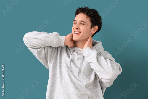 Young man in grey hoodie on...