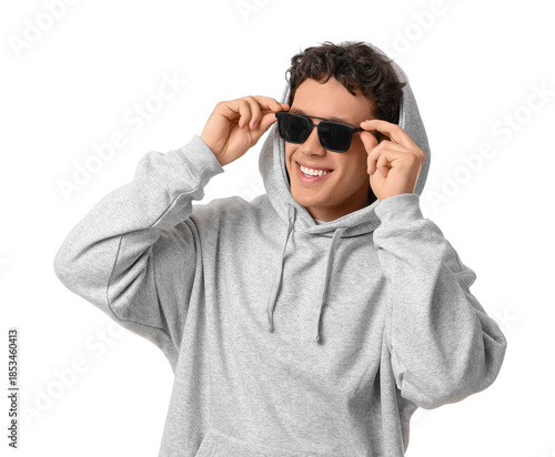 Young man in grey hoodie wi...