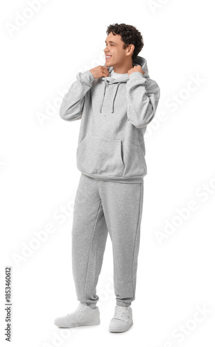 Young man in grey sports su...