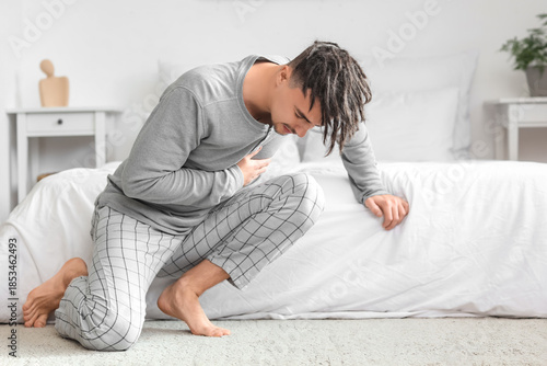 Young man having panic atta...