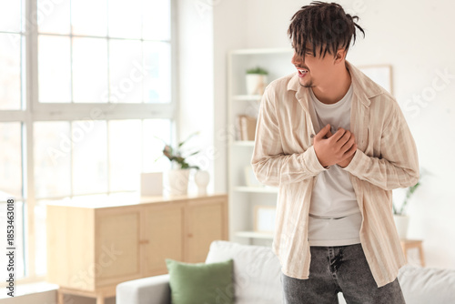 Young man having panic atta...