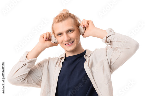 Young blonde man in headpho...