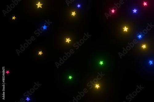 黒背景に輝くたくさんのカラフルな星