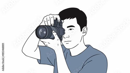 Man holding a professional camera and taking a picture.