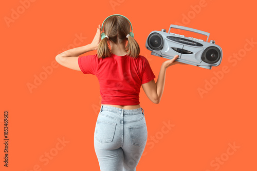 Young woman in headphones w...