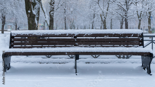 Snowy Park Benches After Heavy Snowfall
