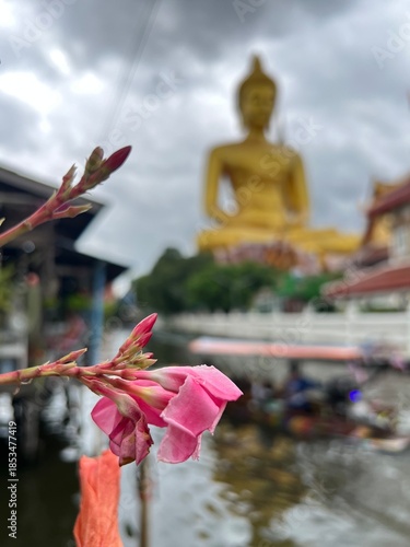 The giant seated buddha statue at the Wat Paknam Phasi Charoen temple, Famous place in Bangkok.
