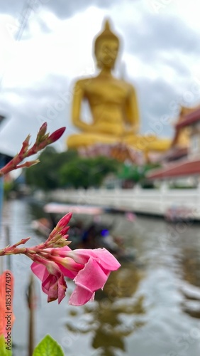 The giant seated buddha statue at the Wat Paknam Phasi Charoen temple, Famous place in Bangkok.
