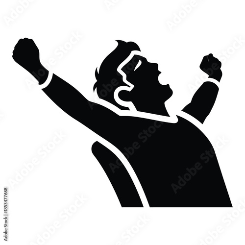 Man celebrating with fists raised in triumph and joy