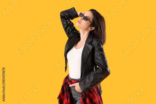 Stylish young woman in blac...
