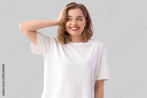 Smiling young woman with bo...