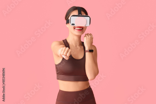 Sporty young woman in moder...