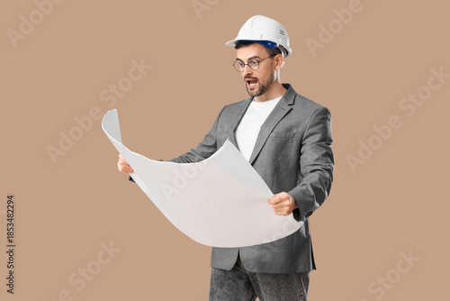 Shocked male architect with...