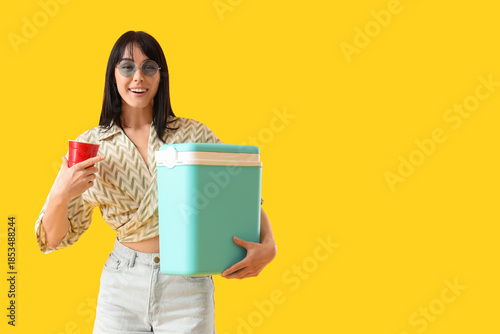 Young woman with portable f...