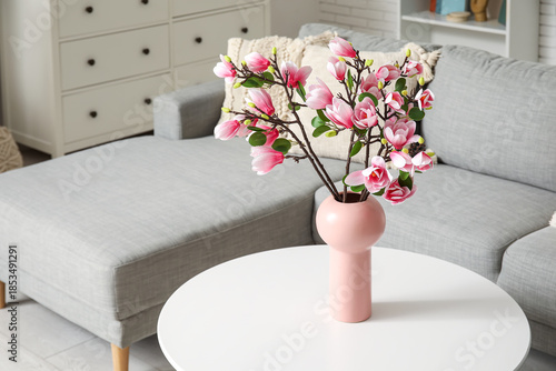 Cozy sofa and blooming magn...