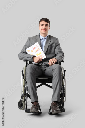 Young businessman in wheelc...