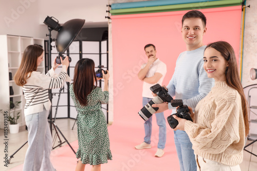 Photographers with cameras ...