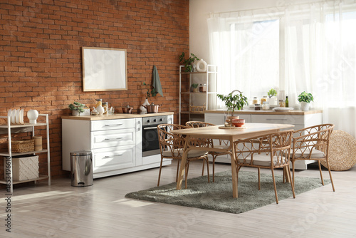Interior of kitchen with di...