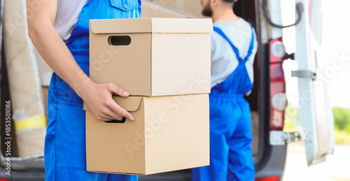 Male mover with boxes from ...