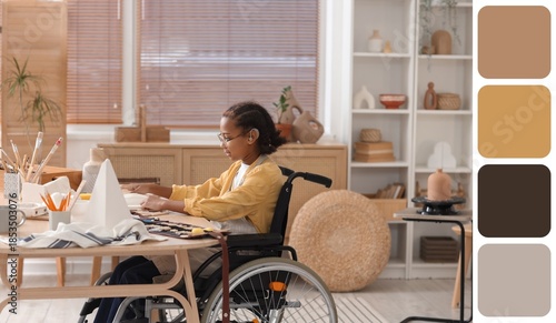 Obraz na plátně Teenage African-American sculptor in wheelchair creating plaster figurine in workshop