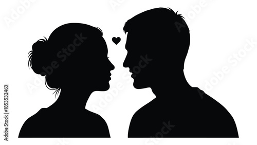 A tender moment between a couple facing each other depicted in silhouette