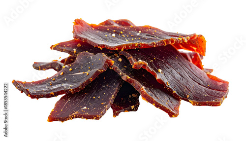 Close-up of a pile of sliced, seasoned, and dried meat with visible texture
