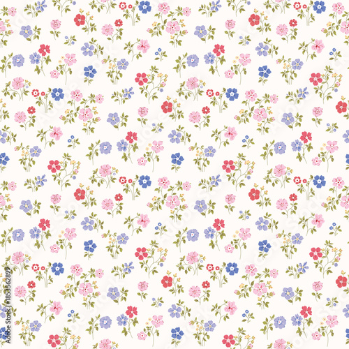 Cute Floral pattern in the small flower. Floral ditsy print. Gentle flower seamless pattern. Pretty mini plant on blue field. Botanical design textile texture. Tiny colorful flowers on light backgroun