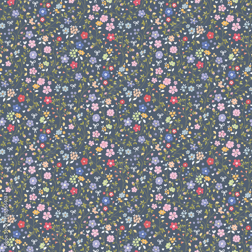 Cute Floral pattern in the small flower. Floral ditsy print. Gentle flower seamless pattern. Pretty mini plant on blue field. Botanical design textile texture. Tiny colorful flowers on blue background
