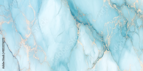 A captivating close up of a turquoise marble slab with delicate gold veins running throughout the stone surface