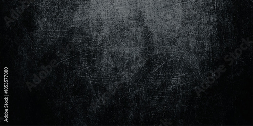 A dark textured background with subtle scratch marks and a grainy distressed appearance creating a moody atmosphere