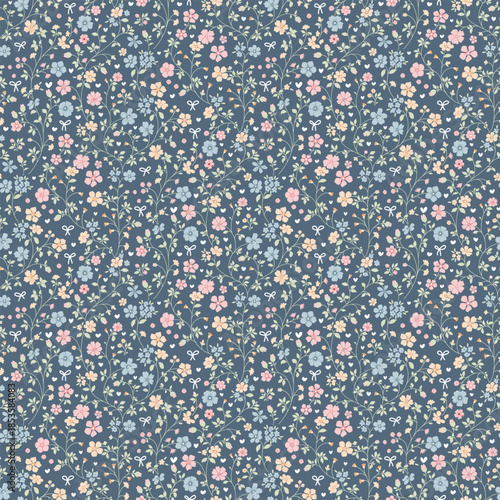 Cute Floral pattern in the small flower. 
Ditsy print. Gentle flower seamless pattern. Pretty mini plants on blue field. Botanical design textile texture. Tiny colorful flowers on blue background