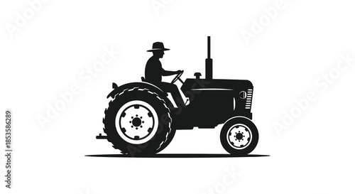 A vintage tractor with a farmer driving depicted in a striking black and white silhouette