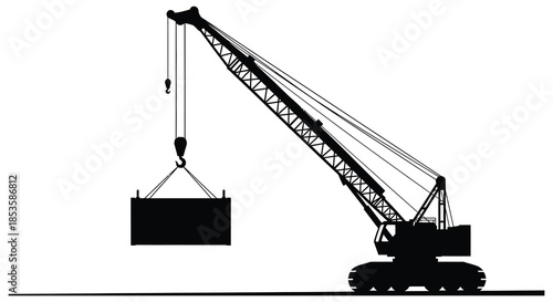 A striking black silhouette of a large construction crane lifting a heavy load showcasing industrial power silhouette