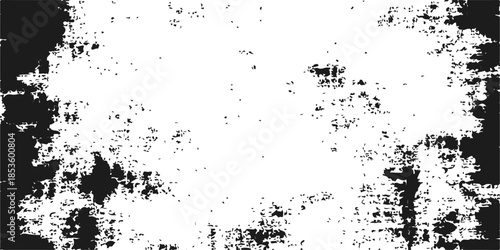 Abstract black grunge background with ink splatters and floral elements