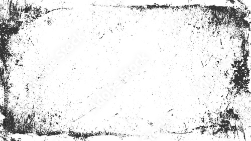 Black and white grunge texture with distressed edges and scattered speckles rough