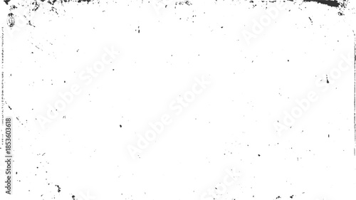 Black speckles and grunge texture on white background with vertical text on left