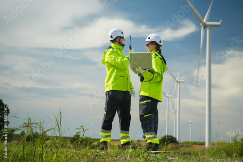 Wind energy maintenance team wind farm professional collaboration outdoor eye-level renewable energy solutions