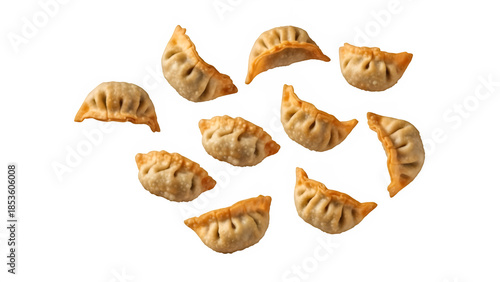 Wallpaper Mural Fried Gyoza dumplings flying falling, isolated on white or transparent background. PNG Torontodigital.ca