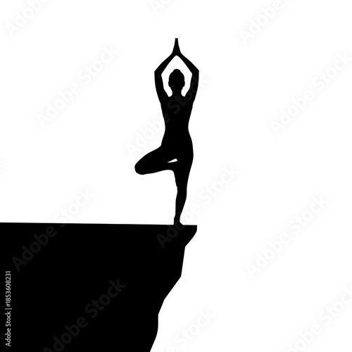 Woman in yoga pose on edge of cliff standing strong
