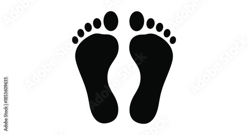 A stark representation of human footprints displaying the sole impressions as a dark silhouette