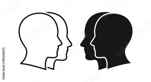Two human heads in profile one white outline and one solid black a striking silhouette