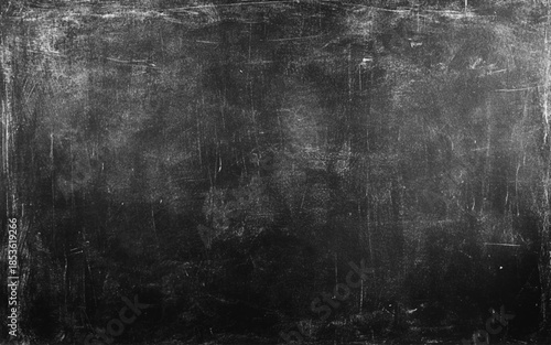 Chalk rubbed out on blackboard background. 