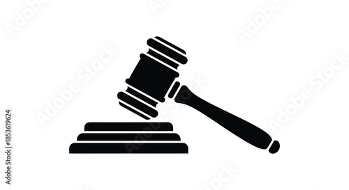 A striking black silhouette of a gavel and sounding block represents justice and legal proceedings silhouette