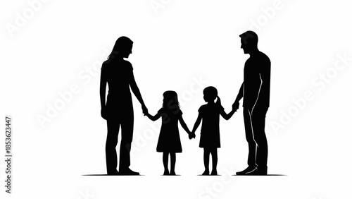 Silhouette of a happy family holding hands together.