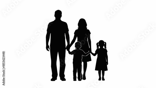 Silhouette of a happy family holding hands together.