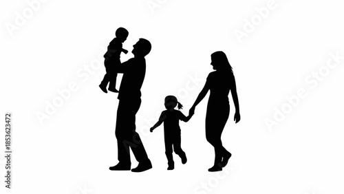 Silhouette of a happy family with two children walking together.