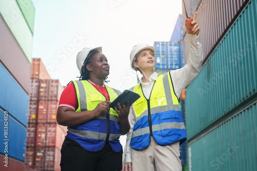 Container shipping coordination port facility business meeting industrial environment ground level logistics management