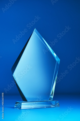 crystal trophy against blue background