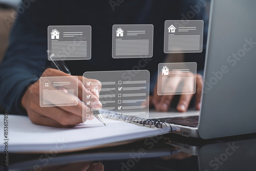 Person reviewing property listings and managing tasks with a digital interface overlaying a notebook and laptop, symbolizing modern real estate planning and efficient workflow.