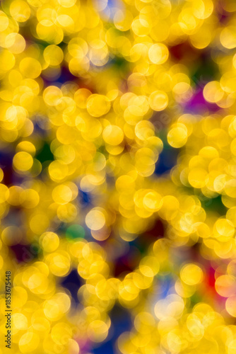 Abstract golden color lights chrismas background. de-focused